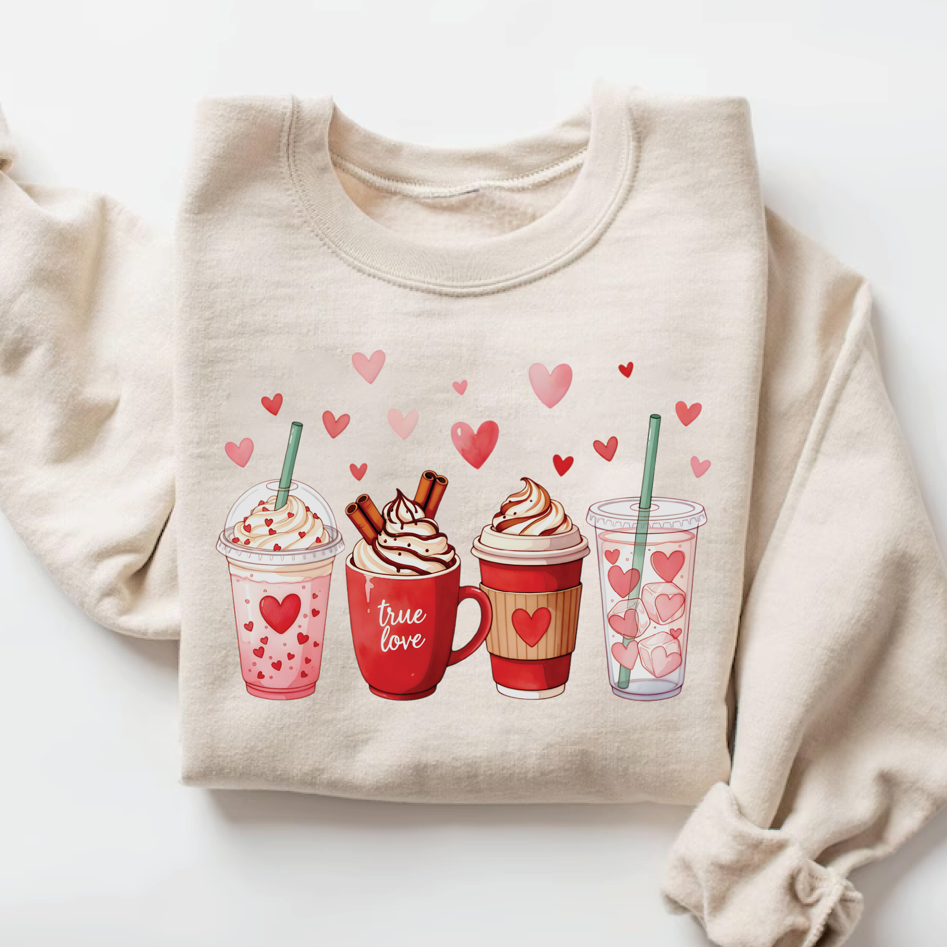 Sand beige pullover sweatshirt with a cute row of coffee cups and heart decorations.