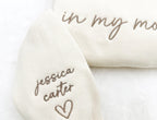 “In My Mom Era embroidered sweatshirt with custom kids’ names on sleeve – neutral cream tone”