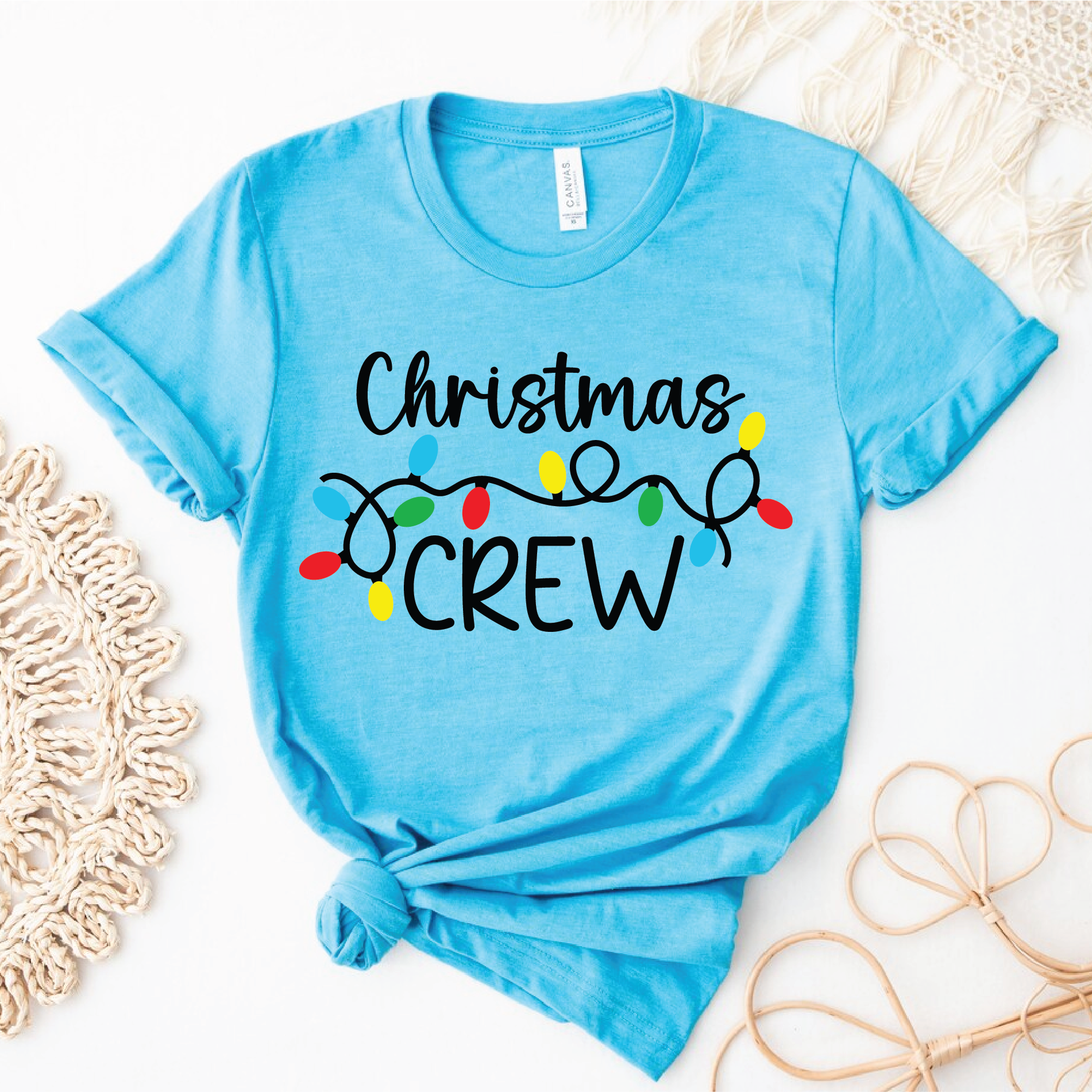 “Christmas Crew T-shirts with colorful holiday light design – matching family Christmas shirts in red and black colors”