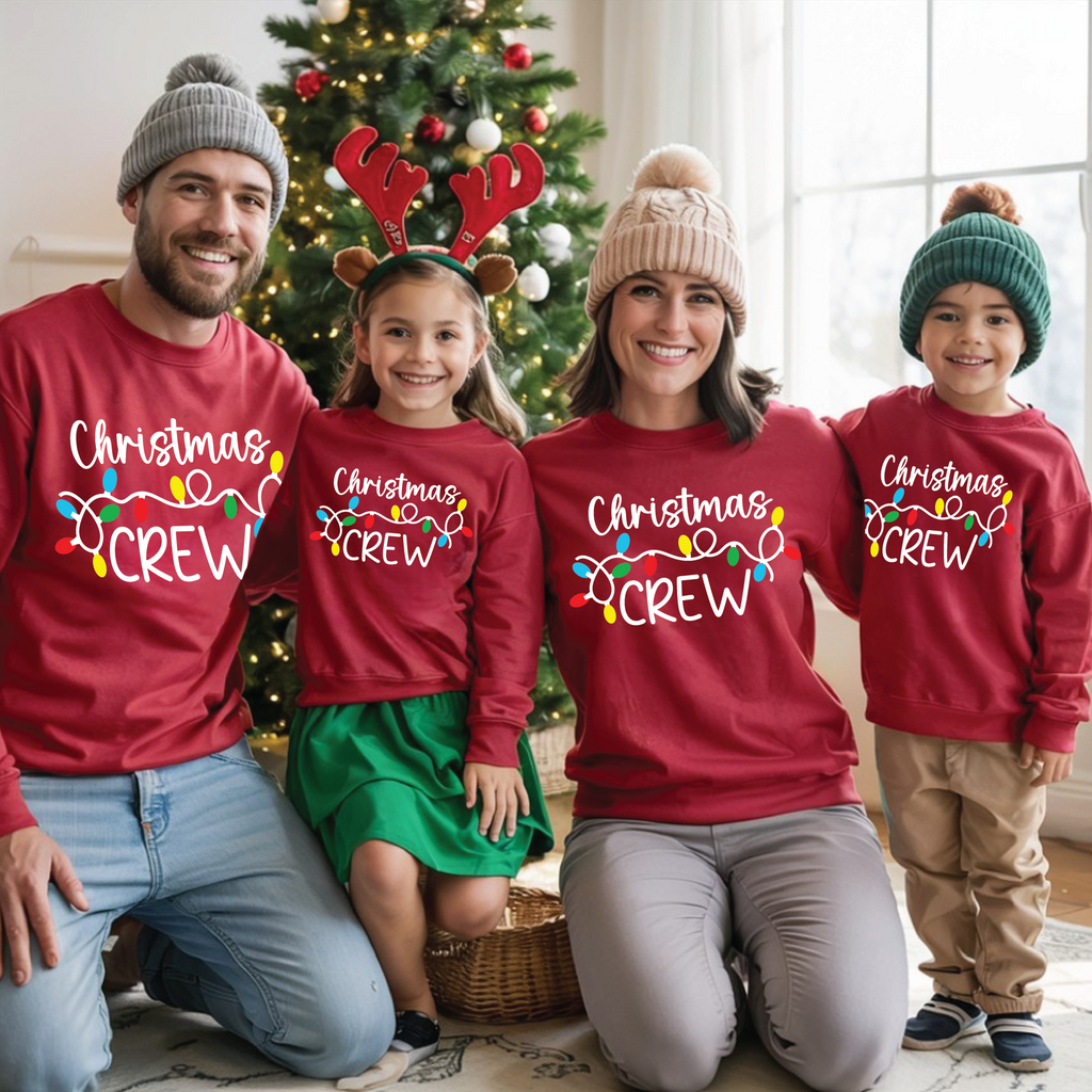 “Christmas Crew T-shirts with colorful holiday light design – matching family Christmas shirts in red and black colors”