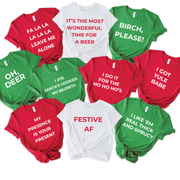 Funny Christmas quote shirts in red, green, and white with humorous holiday sayings