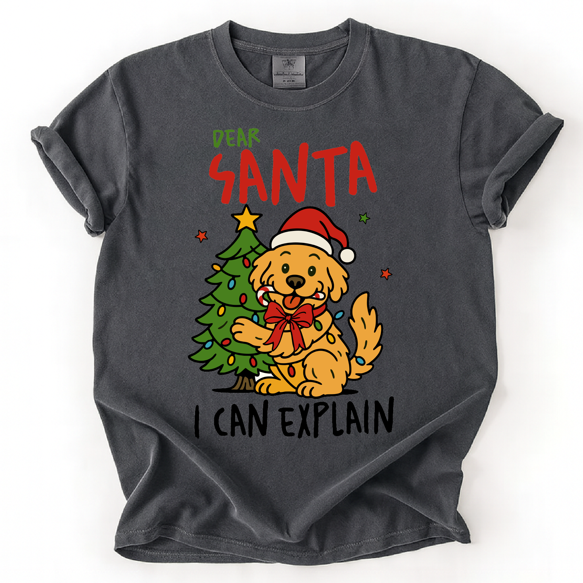 Ivory t-shirt with “Dear Santa I Can Explain” text and cute dog in Santa hat beside Christmas tree 1